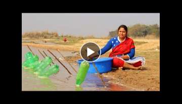 Fishing video || Village lady catching big fish in the river with using bottle || Best fishing tr...